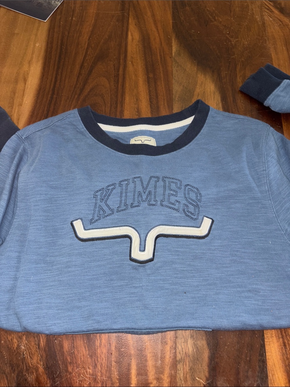 Kimes Ranch Light Blue tee pull over with Navy Trim